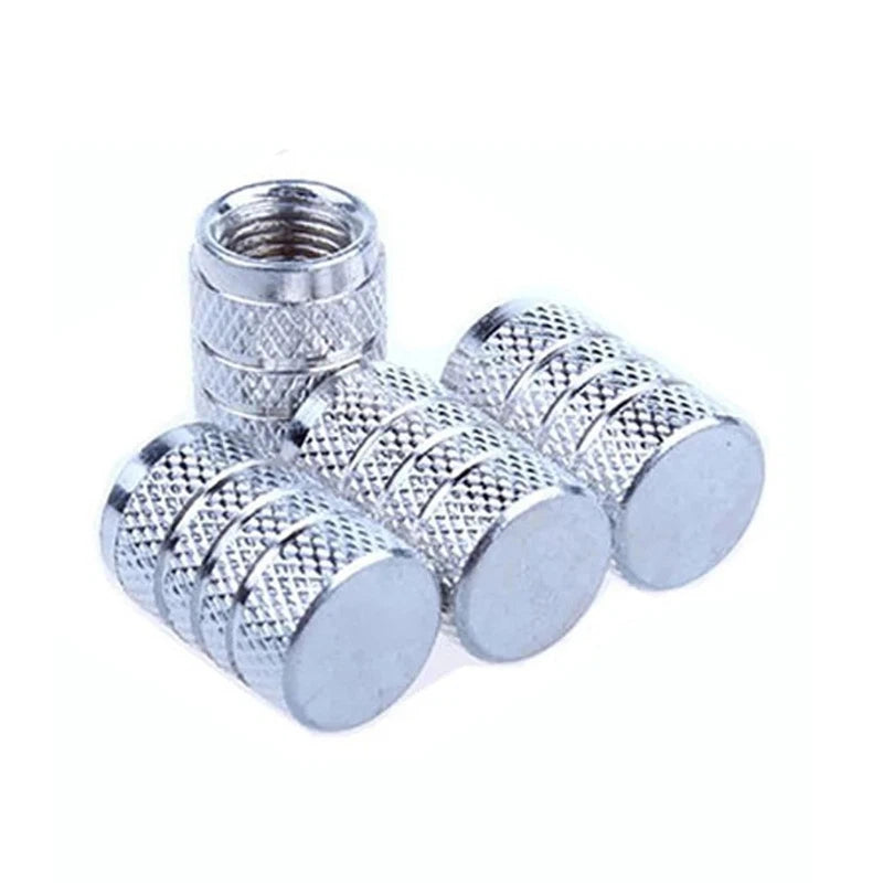 Aluminium valve caps close-up showing O-ring