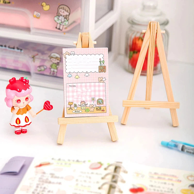 Wooden easel stand holding menu card at wedding