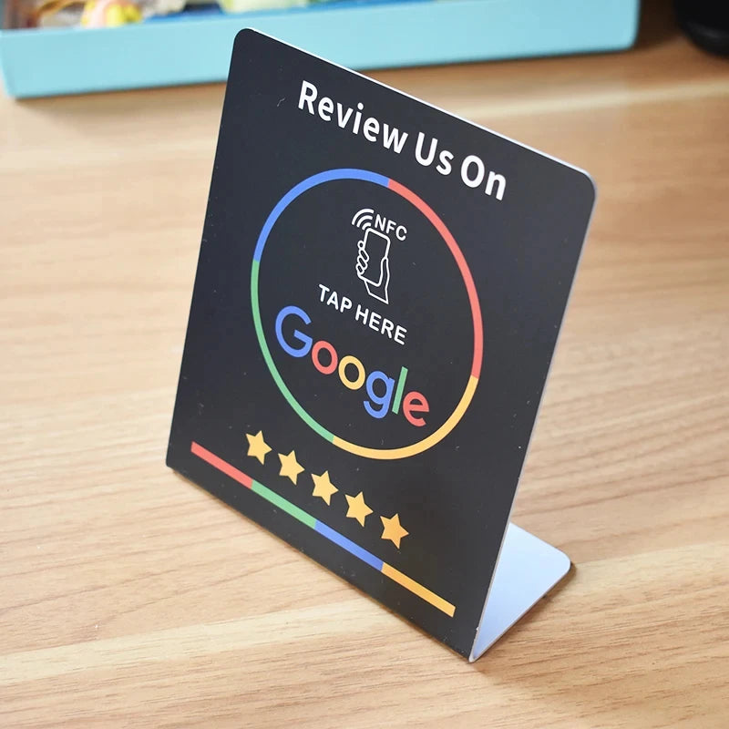 NFC review stand displaying tap to review message