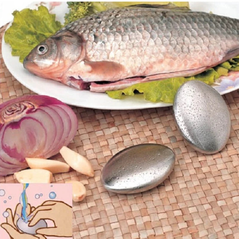Chef using stainless steel soap bar to remove garlic odours