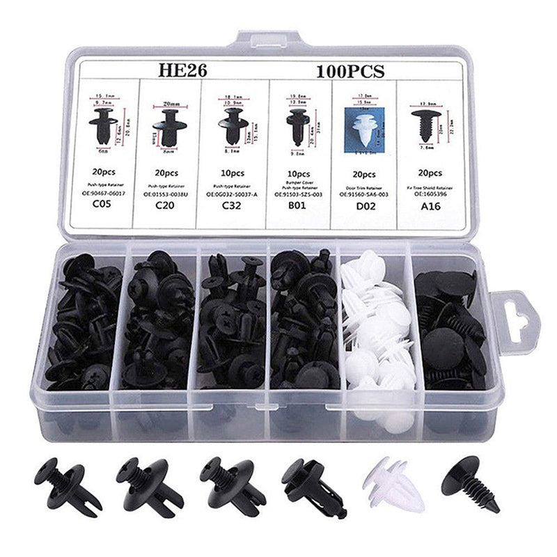Black and white plastic car fastener rivets close-up