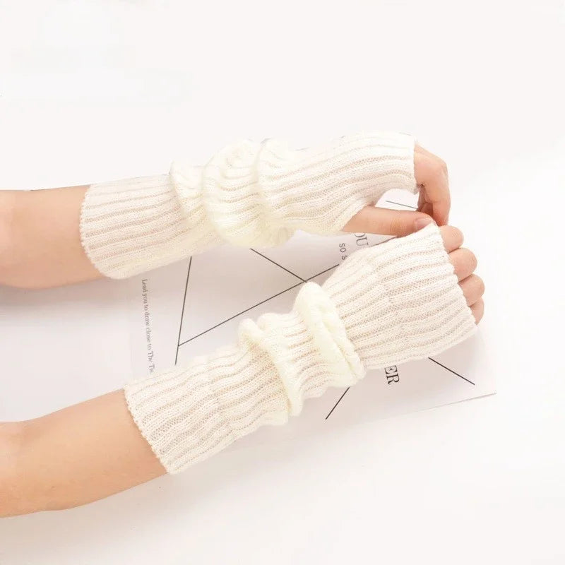 Women's fingerless arm warmers in various colours showing 30cm length