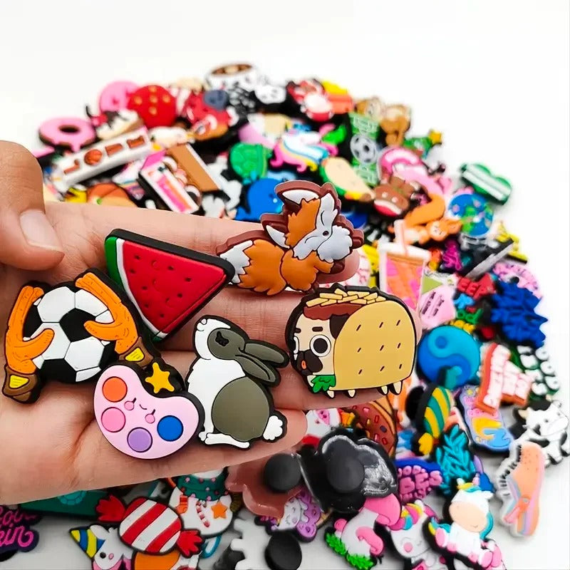 Colourful cartoon shoe charms displaying variety of fun designs