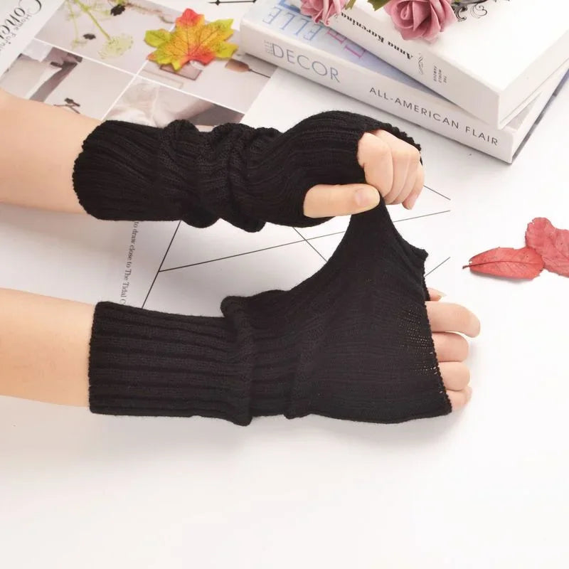 Fingerless arm warmers detail showing soft knit texture