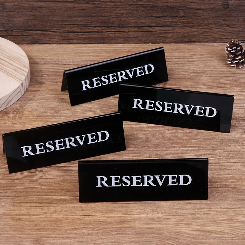 White acrylic reserved table sign showing elegant finish