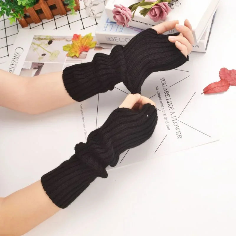 Fingerless gloves thumb hole allowing full hand mobility