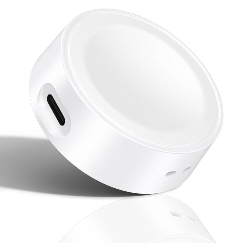 Samsung Galaxy Watch sitting on single head charging dock