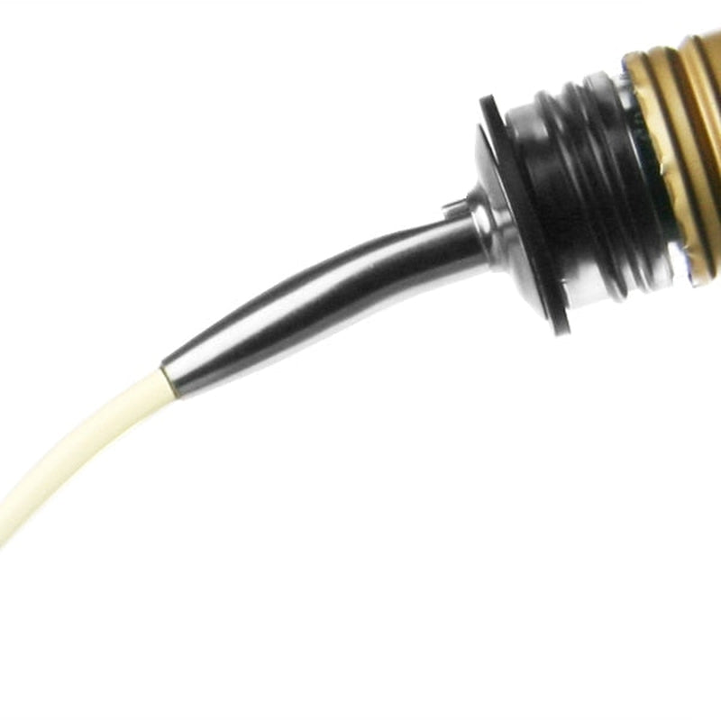 Free flow speed pourer shown in use on bottle