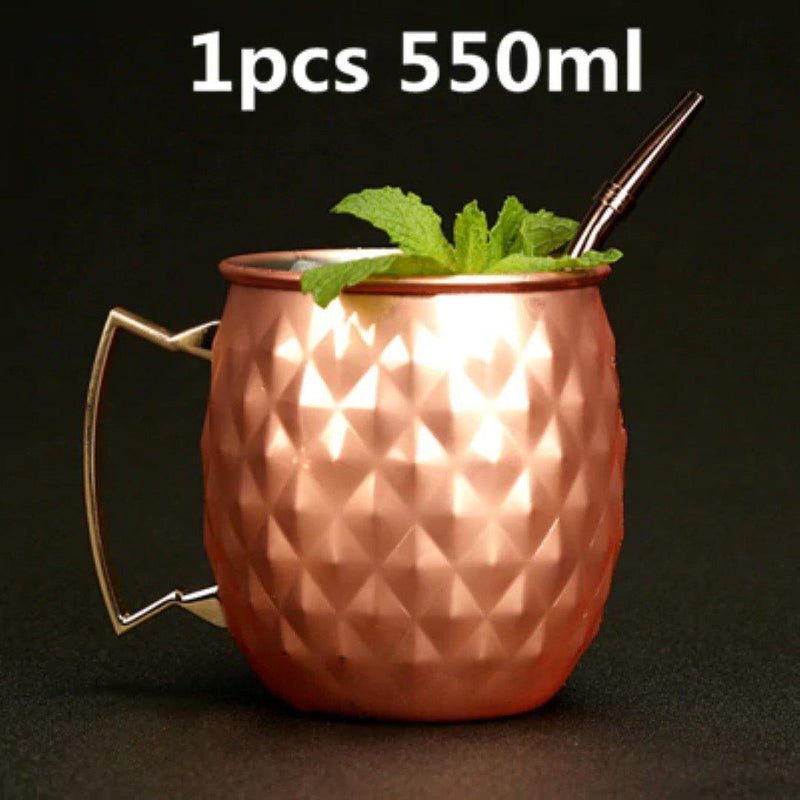 Decorative hammered pattern detail on copper Moscow Mule mug