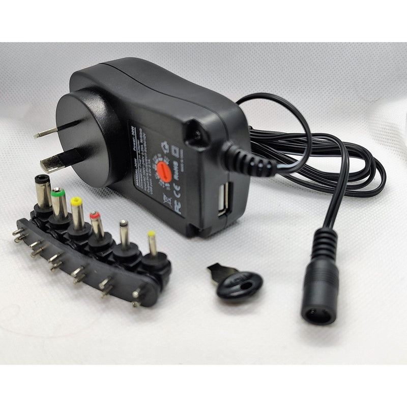Universal DC power adapter with voltage selector and 6 interchangeable plugs