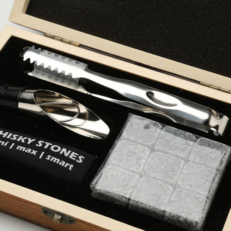 Granite whiskey stones set showing wooden box and accessories