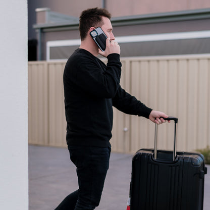 PowerPack Mini in use with finger loop