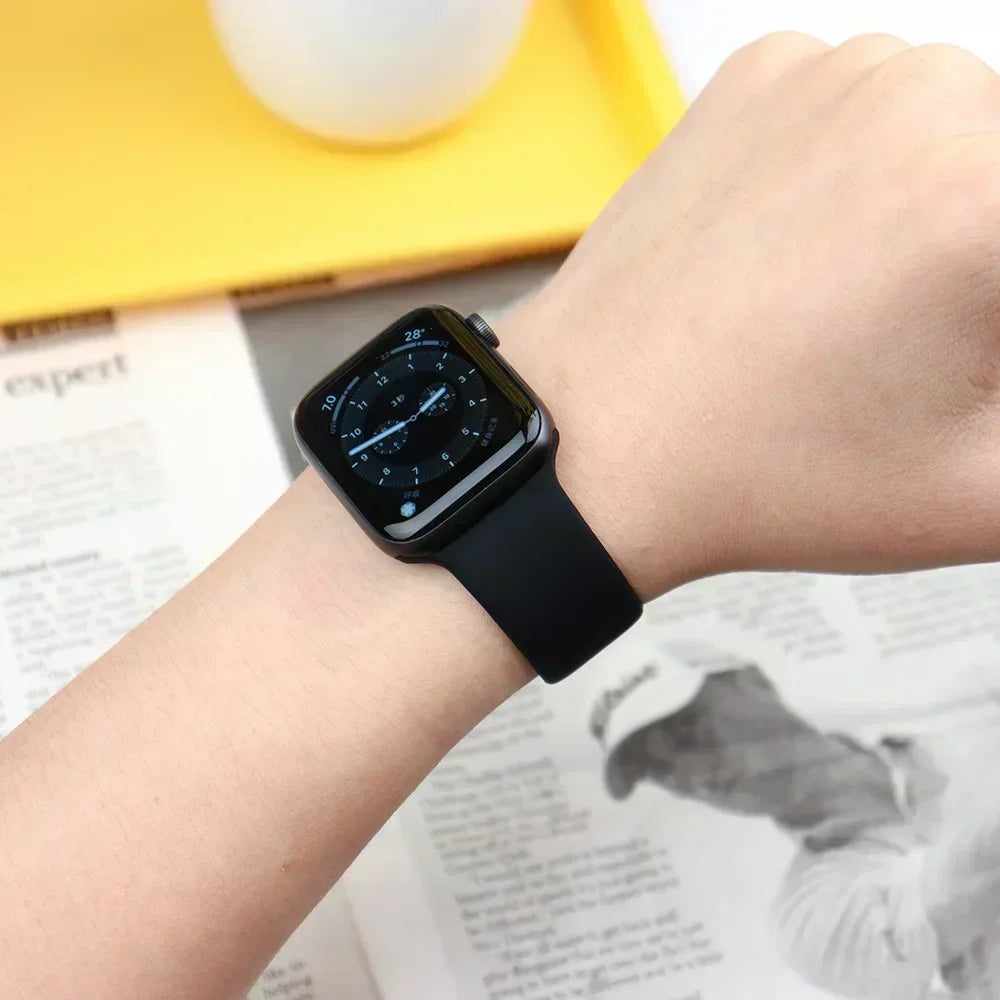 Black silicone sport band on Apple Watch